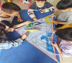 新寧縣清江橋鄉(xiāng)中間幼兒園開展風箏舞春意——巧手繪風箏教育運動