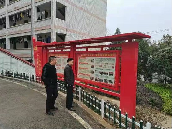 洞口縣教育局向?qū)矶纯谒闹袡z查工作